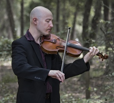 Julian Lambertson, founder of Green String Music Lessons
