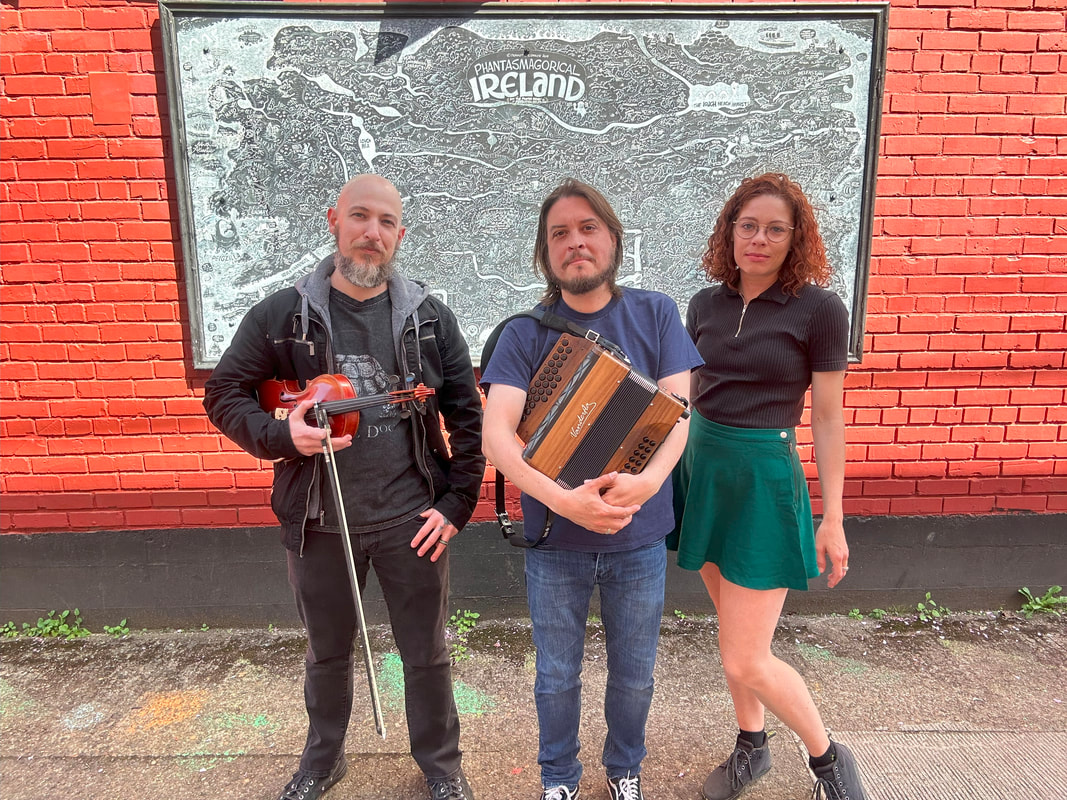 Picture of Julian Lambertson, owner of Green String Music Lessons, with his band Nearing Neara